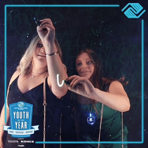 scribble photo booth with 2 ladies drawing